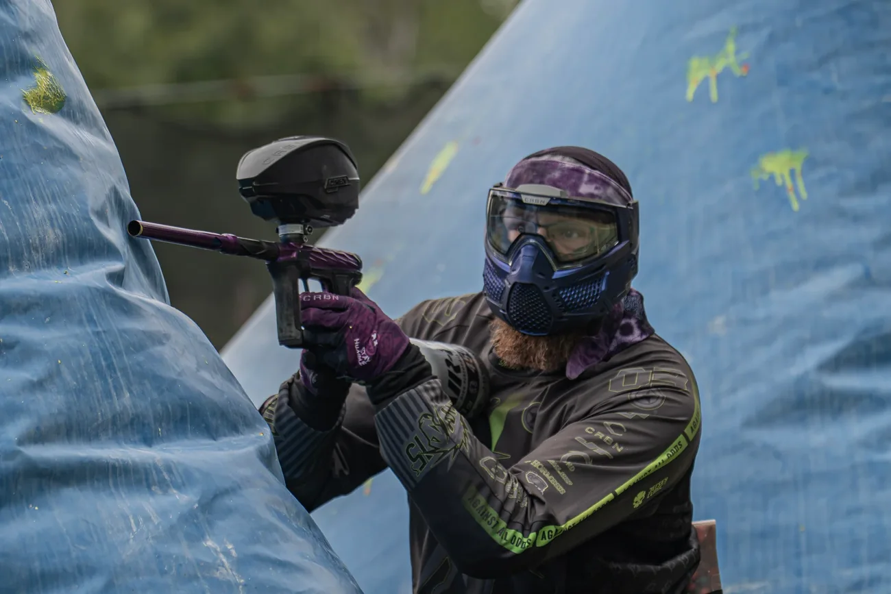 Player aiming around an inflatable Speedball bunker